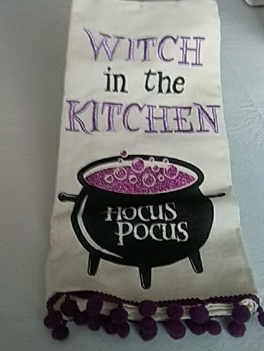 Spirit Halloween Tea Towel with Purple Bubbly Cauldron & Black Lettering